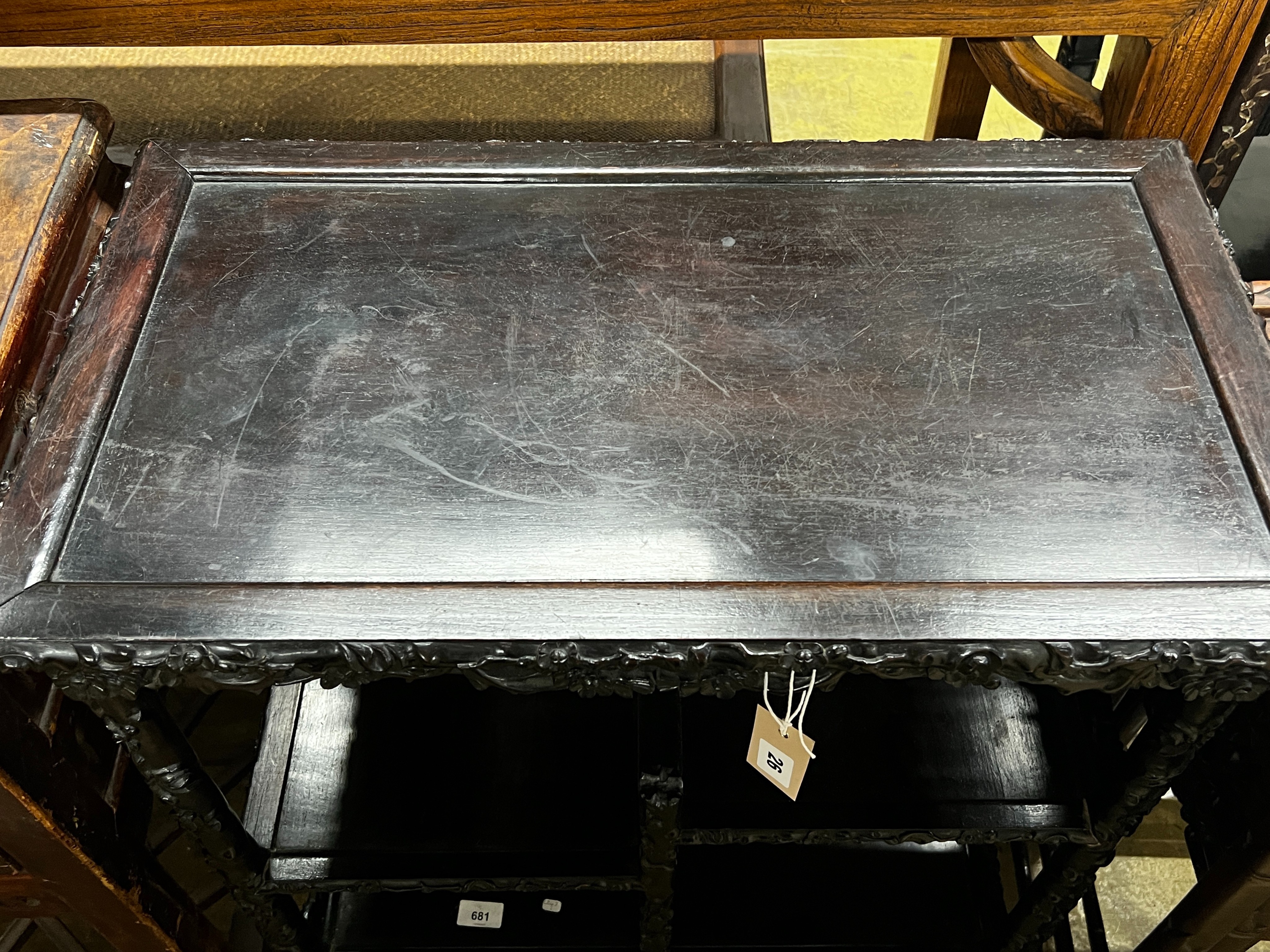 A Chinese rectangular carved hongmu tiered display table, length 67cm, depth 38cm, height 78cm *Please note the sale commences at 9am.